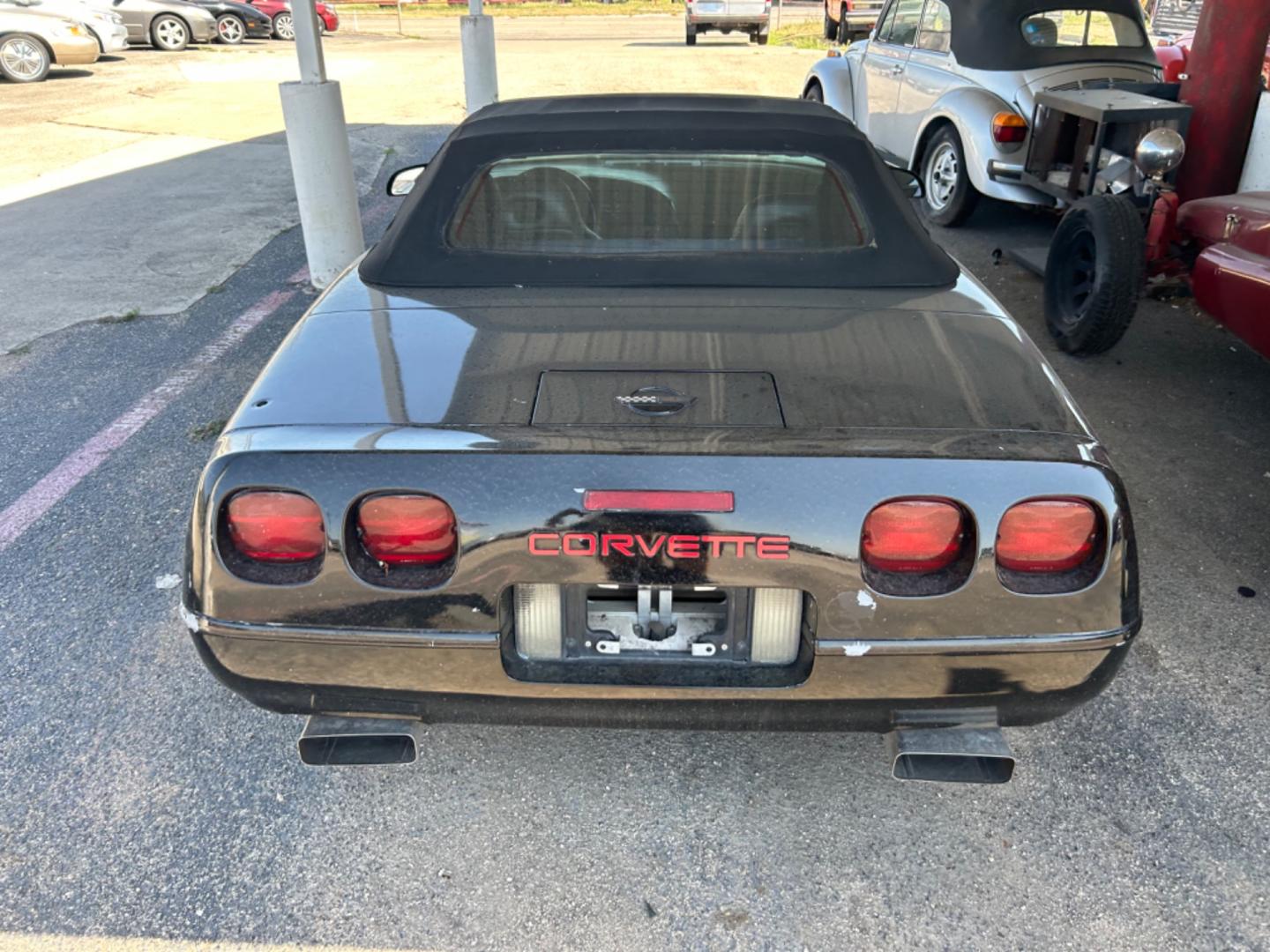 1994 Black /Black Chevrolet Corvette Convertible (1G1YY32P6R5) with an 5.7L V8 OHV 12V engine, 5SPD transmission, located at 1687 Business 35 S, New Braunfels, TX, 78130, (830) 625-7159, 29.655487, -98.051491 - Photo#1